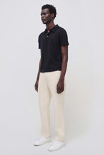 Load image into Gallery viewer, https://shoozeboutique.com/products/simkhai-barron-short-sleeve-polo-black
